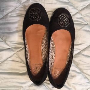 Black flats with medallion embellished toes